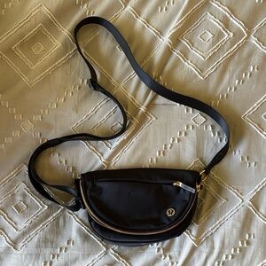 Black Crossbody Bag with Gold Accents